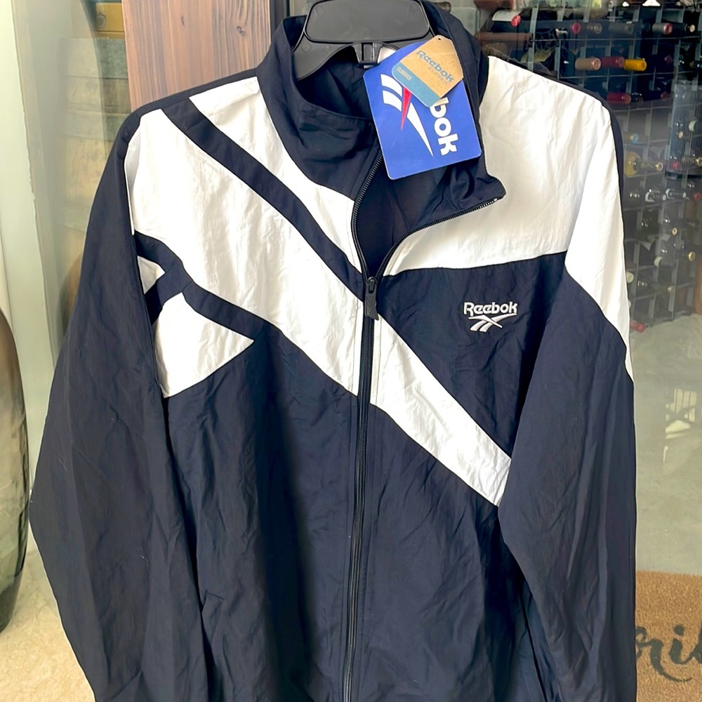 NEVER WORN - Men’s Reebok windbreaker jacket.
